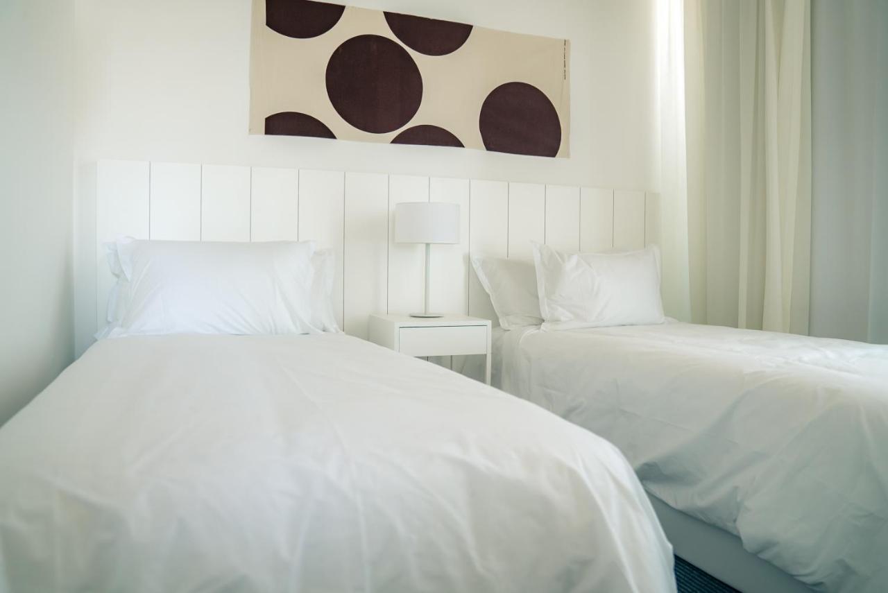 Casagrande Hotel & Beach Club ホセ・イグナシオ エクステリア 写真 A bedroom with two single beds